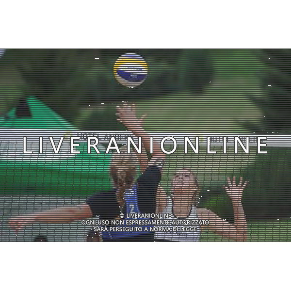 20.08.2014 - Stare Jablonki , siatkowka plazowa , beach volleyball , World Tour , FIVB Stare Jablonki Grand Slam 2014 , Niemcy (niebieski) -Kanada (bialy) , Germany (blue) - Canada (white) N/Z Britta Buthe , Taylor Pischke Fot. Karol Bartnik / MPAimages.com/NEWSPIX.PL --- Newspix.pl /Agenzia Aldo Liverani sas - ITALY ONLY - Germania - Canada beach volley, World Tour, FIVB Grande Slam 2014 *** Local Caption *** www.newspix.pl mail us: info@newspix.pl call us: 0048 022 23 22 222 --- Polish Picture Agency by Ringier Axel Springer Poland