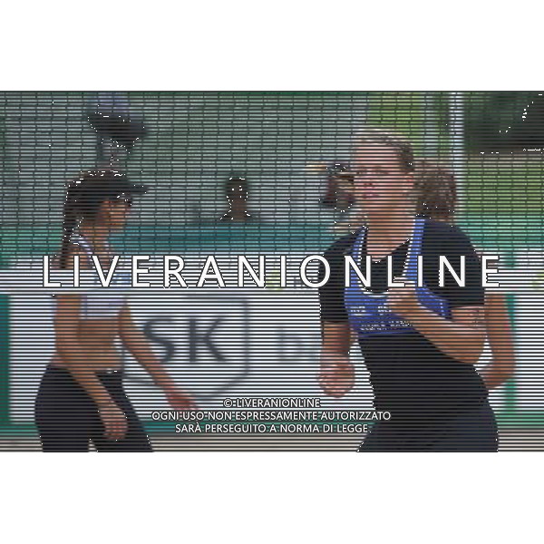 20.08.2014 - Stare Jablonki , siatkowka plazowa , beach volleyball , World Tour , FIVB Stare Jablonki Grand Slam 2014 , Niemcy (niebieski) -Kanada (bialy) , Germany (blue) - Canada (white) N/Z Britta Buthe Fot. Karol Bartnik / MPAimages.com/NEWSPIX.PL --- Newspix.pl /Agenzia Aldo Liverani sas - ITALY ONLY - Germania - Canada beach volley, World Tour, FIVB Grande Slam 2014 *** Local Caption *** www.newspix.pl mail us: info@newspix.pl call us: 0048 022 23 22 222 --- Polish Picture Agency by Ringier Axel Springer Poland