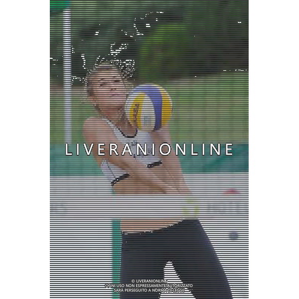 20.08.2014 - Stare Jablonki , siatkowka plazowa , beach volleyball , World Tour , FIVB Stare Jablonki Grand Slam 2014 , Niemcy (niebieski) -Kanada (bialy) , Germany (blue) - Canada (white) N/Z Taylor Pischke Fot. Karol Bartnik / MPAimages.com/NEWSPIX.PL --- Newspix.pl /Agenzia Aldo Liverani sas - ITALY ONLY - Germania - Canada beach volley, World Tour, FIVB Grande Slam 2014 *** Local Caption *** www.newspix.pl mail us: info@newspix.pl call us: 0048 022 23 22 222 --- Polish Picture Agency by Ringier Axel Springer Poland