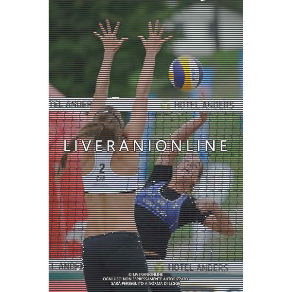 20.08.2014 - Stare Jablonki , siatkowka plazowa , beach volleyball , World Tour , FIVB Stare Jablonki Grand Slam 2014 , Niemcy (niebieski) -Kanada (bialy) , Germany (blue) - Canada (white) N/Z Taylor Pischke , Britta Buthe Fot. Karol Bartnik / MPAimages.com/NEWSPIX.PL --- Newspix.pl /Agenzia Aldo Liverani sas - ITALY ONLY - Germania - Canada beach volley, World Tour, FIVB Grande Slam 2014 *** Local Caption *** www.newspix.pl mail us: info@newspix.pl call us: 0048 022 23 22 222 --- Polish Picture Agency by Ringier Axel Springer Poland