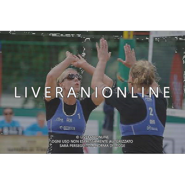20.08.2014 - Stare Jablonki , siatkowka plazowa , beach volleyball , World Tour , FIVB Stare Jablonki Grand Slam 2014 , Niemcy (niebieski) -Kanada (bialy) , Germany (blue) - Canada (white) N/Z Karla Borger , Britta Buthe Fot. Karol Bartnik / MPAimages.com/NEWSPIX.PL --- Newspix.pl /Agenzia Aldo Liverani sas - ITALY ONLY - Germania - Canada beach volley, World Tour, FIVB Grande Slam 2014 *** Local Caption *** www.newspix.pl mail us: info@newspix.pl call us: 0048 022 23 22 222 --- Polish Picture Agency by Ringier Axel Springer Poland