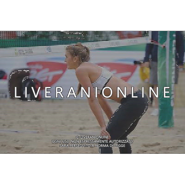 20.08.2014 - Stare Jablonki , siatkowka plazowa , beach volleyball , World Tour , FIVB Stare Jablonki Grand Slam 2014 , Niemcy (niebieski) -Kanada (bialy) , Germany (blue) - Canada (white) N/Z Taylor Pischke Fot. Karol Bartnik / MPAimages.com/NEWSPIX.PL --- Newspix.pl /Agenzia Aldo Liverani sas - ITALY ONLY - Germania - Canada beach volley, World Tour, FIVB Grande Slam 2014 *** Local Caption *** www.newspix.pl mail us: info@newspix.pl call us: 0048 022 23 22 222 --- Polish Picture Agency by Ringier Axel Springer Poland