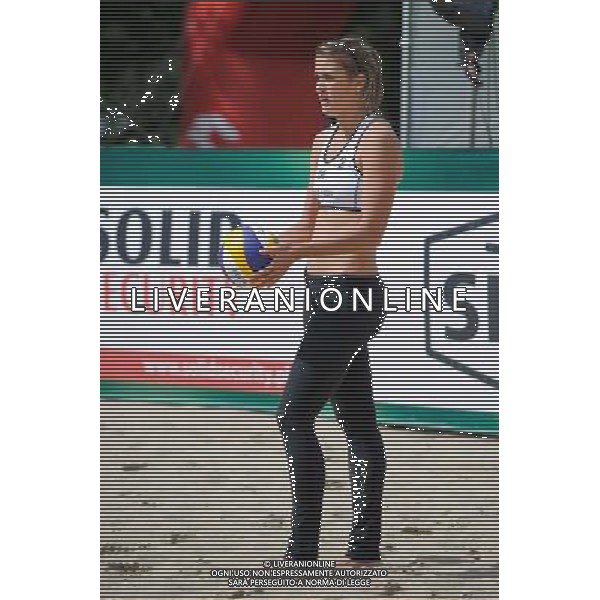 20.08.2014 - Stare Jablonki , siatkowka plazowa , beach volleyball , World Tour , FIVB Stare Jablonki Grand Slam 2014 , Niemcy (niebieski) -Kanada (bialy) , Germany (blue) - Canada (white) N/Z Taylor Pischke Fot. Karol Bartnik / MPAimages.com/NEWSPIX.PL --- Newspix.pl /Agenzia Aldo Liverani sas - ITALY ONLY - Germania - Canada beach volley, World Tour, FIVB Grande Slam 2014 *** Local Caption *** www.newspix.pl mail us: info@newspix.pl call us: 0048 022 23 22 222 --- Polish Picture Agency by Ringier Axel Springer Poland