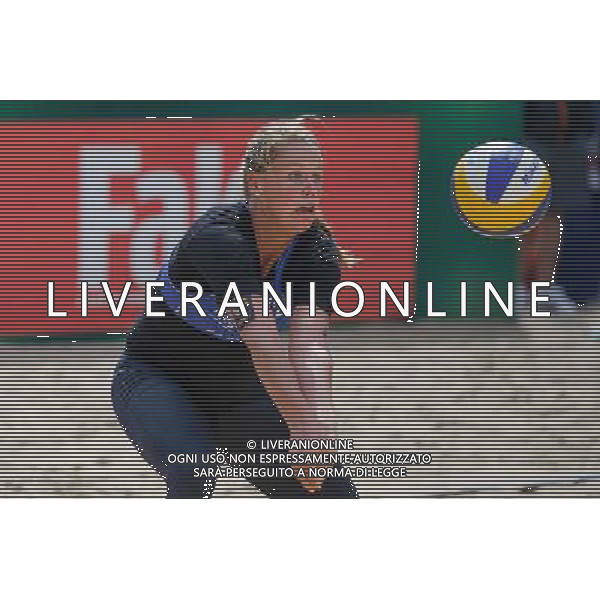 20.08.2014 - Stare Jablonki , siatkowka plazowa , beach volleyball , World Tour , FIVB Stare Jablonki Grand Slam 2014 , Niemcy (niebieski) -Kanada (bialy) , Germany (blue) - Canada (white) N/Z Britta Buthe Fot. Karol Bartnik / MPAimages.com/NEWSPIX.PL --- Newspix.pl /Agenzia Aldo Liverani sas - ITALY ONLY - Germania - Canada beach volley, World Tour, FIVB Grande Slam 2014 *** Local Caption *** www.newspix.pl mail us: info@newspix.pl call us: 0048 022 23 22 222 --- Polish Picture Agency by Ringier Axel Springer Poland