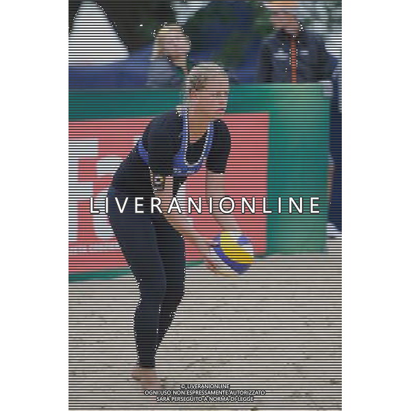 20.08.2014 - Stare Jablonki , siatkowka plazowa , beach volleyball , World Tour , FIVB Stare Jablonki Grand Slam 2014 , Niemcy (niebieski) -Kanada (bialy) , Germany (blue) - Canada (white) N/Z Britta Buthe Fot. Karol Bartnik / MPAimages.com/NEWSPIX.PL --- Newspix.pl /Agenzia Aldo Liverani sas - ITALY ONLY - Germania - Canada beach volley, World Tour, FIVB Grande Slam 2014 *** Local Caption *** www.newspix.pl mail us: info@newspix.pl call us: 0048 022 23 22 222 --- Polish Picture Agency by Ringier Axel Springer Poland