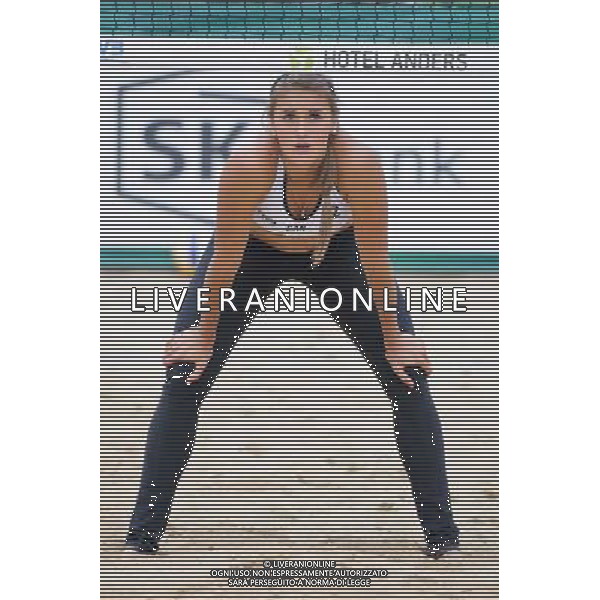 20.08.2014 - Stare Jablonki , siatkowka plazowa , beach volleyball , World Tour , FIVB Stare Jablonki Grand Slam 2014 , Niemcy (niebieski) -Kanada (bialy) , Germany (blue) - Canada (white) N/Z Taylor Pischke Fot. Karol Bartnik / MPAimages.com/NEWSPIX.PL --- Newspix.pl /Agenzia Aldo Liverani sas - ITALY ONLY - Germania - Canada beach volley, World Tour, FIVB Grande Slam 2014 *** Local Caption *** www.newspix.pl mail us: info@newspix.pl call us: 0048 022 23 22 222 --- Polish Picture Agency by Ringier Axel Springer Poland