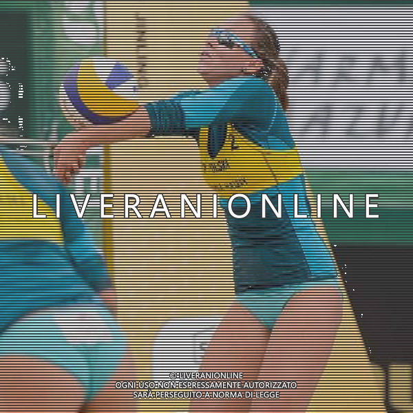 20.08.2014 - Stare Jablonki , siatkowka plazowa , beach volleyball , World Tour , FIVB Stare Jablonki Grand Slam 2014 , Polska (zolte) - Rosja (biale) , Poland - Russia N/Z Karolina Baran Fot. Mariusz Palczynski / MPAimages.com/NEWSPIX.PL --- Newspix.pl /Agenzia Aldo Liverani sas - ITALY ONLY - Polonia - Russia beach volley, World Tour, FIVB Stare Jablonki Grande Slam 2014 *** Local Caption *** www.newspix.pl mail us: info@newspix.pl call us: 0048 022 23 22 222 --- Polish Picture Agency by Ringier Axel Springer Poland