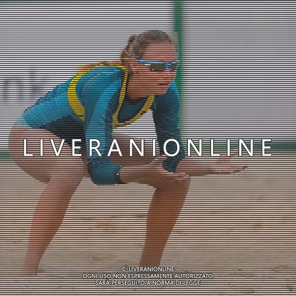 20.08.2014 - Stare Jablonki , siatkowka plazowa , beach volleyball , World Tour , FIVB Stare Jablonki Grand Slam 2014 , Polska (zolte) - Rosja (biale) , Poland - Russia N/Z Karolina Baran Fot. Mariusz Palczynski / MPAimages.com/NEWSPIX.PL --- Newspix.pl /Agenzia Aldo Liverani sas - ITALY ONLY - Polonia - Russia beach volley, World Tour, FIVB Stare Jablonki Grande Slam 2014 *** Local Caption *** www.newspix.pl mail us: info@newspix.pl call us: 0048 022 23 22 222 --- Polish Picture Agency by Ringier Axel Springer Poland