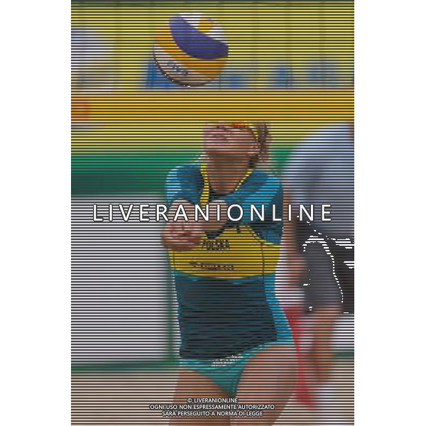 20.08.2014 - Stare Jablonki , siatkowka plazowa , beach volleyball , World Tour , FIVB Stare Jablonki Grand Slam 2014 , Polska (zolte) - Rosja (biale) , Poland - Russia N/Z Jagoda Gruszczynska Fot. Mariusz Palczynski / MPAimages.com/NEWSPIX.PL --- Newspix.pl /Agenzia Aldo Liverani sas - ITALY ONLY - Polonia - Russia beach volley, World Tour, FIVB Stare Jablonki Grande Slam 2014 *** Local Caption *** www.newspix.pl mail us: info@newspix.pl call us: 0048 022 23 22 222 --- Polish Picture Agency by Ringier Axel Springer Poland