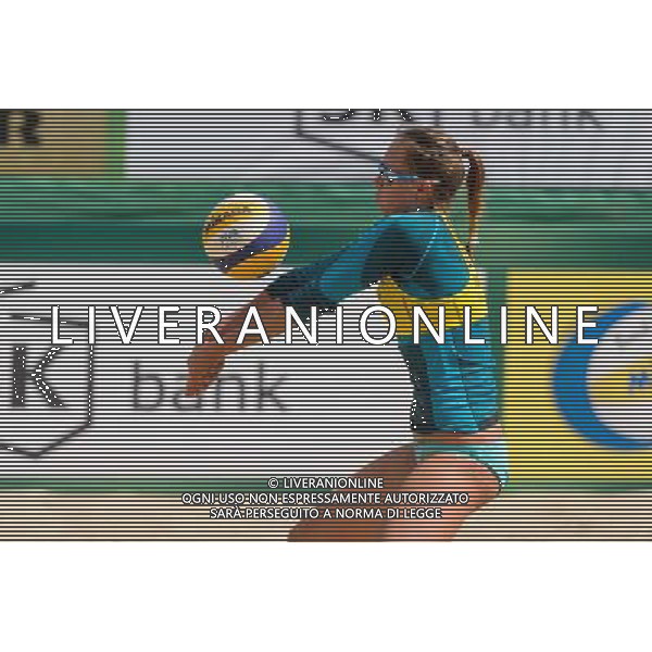 20.08.2014 - Stare Jablonki , siatkowka plazowa , beach volleyball , World Tour , FIVB Stare Jablonki Grand Slam 2014 , Polska (zolte) - Rosja (biale) , Poland - Russia N/Z Karolina Baran Fot. Mariusz Palczynski / MPAimages.com/NEWSPIX.PL --- Newspix.pl /Agenzia Aldo Liverani sas - ITALY ONLY - Polonia - Russia beach volley, World Tour, FIVB Stare Jablonki Grande Slam 2014 *** Local Caption *** www.newspix.pl mail us: info@newspix.pl call us: 0048 022 23 22 222 --- Polish Picture Agency by Ringier Axel Springer Poland