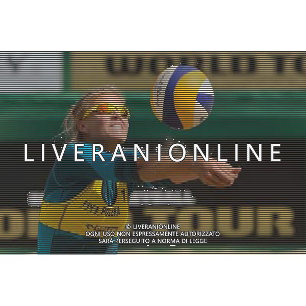 20.08.2014 - Stare Jablonki , siatkowka plazowa , beach volleyball , World Tour , FIVB Stare Jablonki Grand Slam 2014 , Polska (zolte) - Rosja (biale) , Poland - Russia N/Z Jagoda Gruszczynska Fot. Mariusz Palczynski / MPAimages.com/NEWSPIX.PL --- Newspix.pl /Agenzia Aldo Liverani sas - ITALY ONLY - Polonia - Russia beach volley, World Tour, FIVB Stare Jablonki Grande Slam 2014 *** Local Caption *** www.newspix.pl mail us: info@newspix.pl call us: 0048 022 23 22 222 --- Polish Picture Agency by Ringier Axel Springer Poland