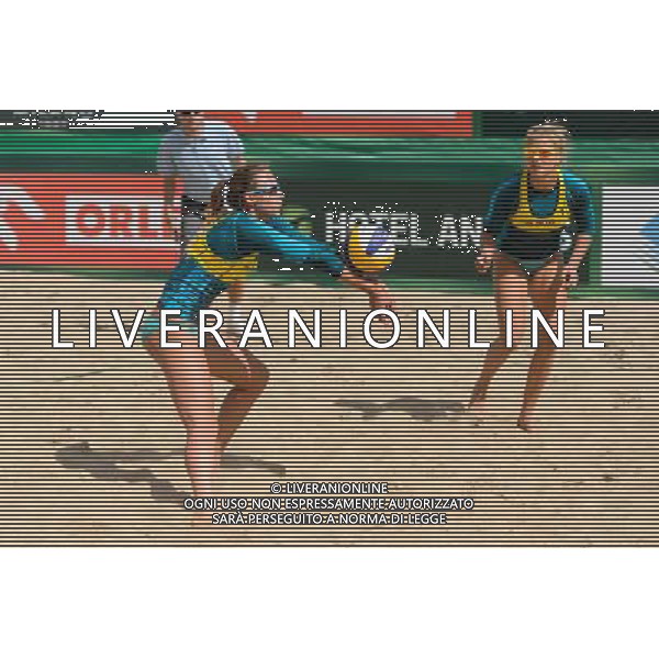 20.08.2014 - Stare Jablonki , siatkowka plazowa , beach volleyball , World Tour , FIVB Stare Jablonki Grand Slam 2014 , Polska (zolte) - Rosja (biale) , Poland - Russia N/Z Karolina Baran , Jagoda Gruszczynska Fot. Mariusz Palczynski / MPAimages.com/NEWSPIX.PL --- Newspix.pl /Agenzia Aldo Liverani sas - ITALY ONLY - Polonia - Russia beach volley, World Tour, FIVB Stare Jablonki Grande Slam 2014 *** Local Caption *** www.newspix.pl mail us: info@newspix.pl call us: 0048 022 23 22 222 --- Polish Picture Agency by Ringier Axel Springer Poland