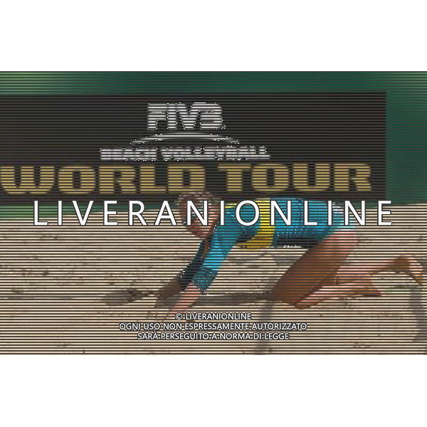 20.08.2014 - Stare Jablonki , siatkowka plazowa , beach volleyball , World Tour , FIVB Stare Jablonki Grand Slam 2014 , Polska (zolte) - Rosja (biale) , Poland - Russia N/Z Karolina Baran Fot. Mariusz Palczynski / MPAimages.com/NEWSPIX.PL --- Newspix.pl /Agenzia Aldo Liverani sas - ITALY ONLY - Polonia - Russia beach volley, World Tour, FIVB Stare Jablonki Grande Slam 2014 *** Local Caption *** www.newspix.pl mail us: info@newspix.pl call us: 0048 022 23 22 222 --- Polish Picture Agency by Ringier Axel Springer Poland