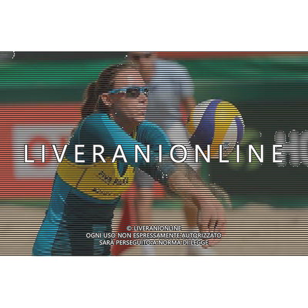 20.08.2014 - Stare Jablonki , siatkowka plazowa , beach volleyball , World Tour , FIVB Stare Jablonki Grand Slam 2014 , Polska (zolte) - Rosja (biale) , Poland - Russia N/Z Karolina Baran Fot. Mariusz Palczynski / MPAimages.com/NEWSPIX.PL --- Newspix.pl /Agenzia Aldo Liverani sas - ITALY ONLY - Polonia - Russia beach volley, World Tour, FIVB Stare Jablonki Grande Slam 2014 *** Local Caption *** www.newspix.pl mail us: info@newspix.pl call us: 0048 022 23 22 222 --- Polish Picture Agency by Ringier Axel Springer Poland