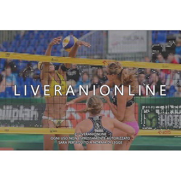 20.08.2014 - Stare Jablonki , siatkowka plazowa , beach volleyball , World Tour , FIVB Stare Jablonki Grand Slam 2014 , Brazylia (zolte) - Polska (czarne) , Brazil - Poland N/Z Juliana Felisberta Da Silva , Dorota Strag Fot. Mariusz Palczynski / MPAimages.com/NEWSPIX.PL --- Newspix.pl /Agenzia Aldo Liverani sas - ITALY ONLY - Brasile - Polonia beach volley, World Tour, FIVB Grande Slam 2014 *** Local Caption *** www.newspix.pl mail us: info@newspix.pl call us: 0048 022 23 22 222 --- Polish Picture Agency by Ringier Axel Springer Poland