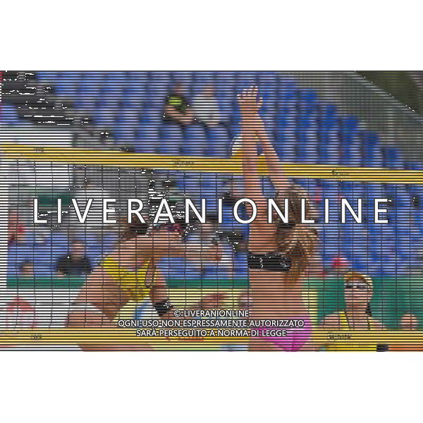 20.08.2014 - Stare Jablonki , siatkowka plazowa , beach volleyball , World Tour , FIVB Stare Jablonki Grand Slam 2014 , Brazylia (zolte) - Polska (czarne) , Brazil - Poland N/Z Maria Antonelli , Dorota Strag Fot. Mariusz Palczynski / MPAimages.com/NEWSPIX.PL --- Newspix.pl /Agenzia Aldo Liverani sas - ITALY ONLY - Brasile - Polonia beach volley, World Tour, FIVB Grande Slam 2014 *** Local Caption *** www.newspix.pl mail us: info@newspix.pl call us: 0048 022 23 22 222 --- Polish Picture Agency by Ringier Axel Springer Poland