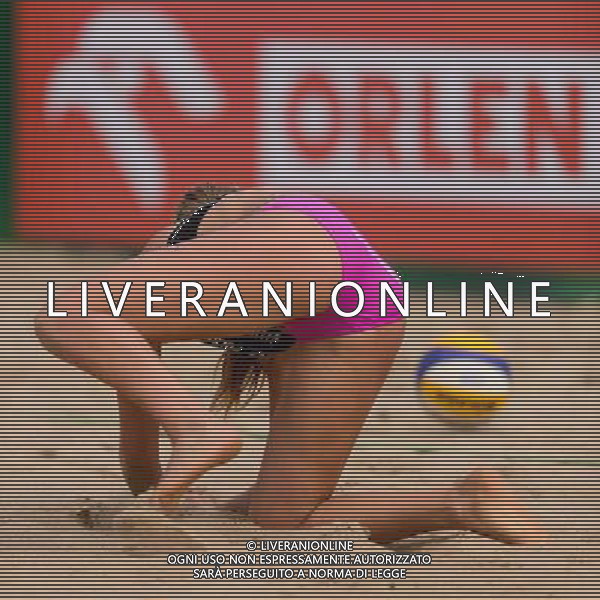 20.08.2014 - Stare Jablonki , siatkowka plazowa , beach volleyball , World Tour , FIVB Stare Jablonki Grand Slam 2014 , Brazylia (zolte) - Polska (czarne) , Brazil - Poland N/Z Katarzyna Kociolek Fot. Mariusz Palczynski / MPAimages.com/NEWSPIX.PL --- Newspix.pl /Agenzia Aldo Liverani sas - ITALY ONLY - Brasile - Polonia beach volley, World Tour, FIVB Grande Slam 2014 *** Local Caption *** www.newspix.pl mail us: info@newspix.pl call us: 0048 022 23 22 222 --- Polish Picture Agency by Ringier Axel Springer Poland