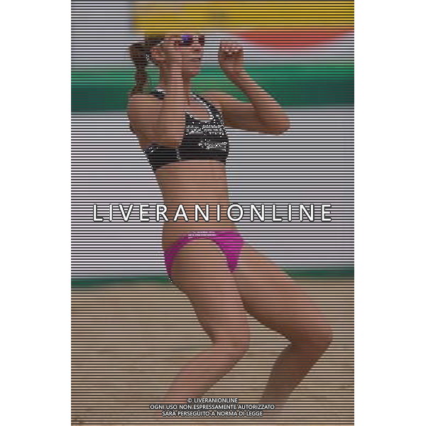 20.08.2014 - Stare Jablonki , siatkowka plazowa , beach volleyball , World Tour , FIVB Stare Jablonki Grand Slam 2014 , Brazylia (zolte) - Polska (czarne) , Brazil - Poland N/Z Katarzyna Kociolek Fot. Mariusz Palczynski / MPAimages.com/NEWSPIX.PL --- Newspix.pl /Agenzia Aldo Liverani sas - ITALY ONLY - Brasile - Polonia beach volley, World Tour, FIVB Grande Slam 2014 *** Local Caption *** www.newspix.pl mail us: info@newspix.pl call us: 0048 022 23 22 222 --- Polish Picture Agency by Ringier Axel Springer Poland