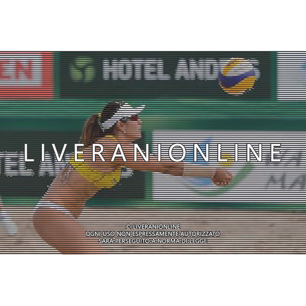 20.08.2014 - Stare Jablonki , siatkowka plazowa , beach volleyball , World Tour , FIVB Stare Jablonki Grand Slam 2014 , Brazylia (zolte) - Polska (czarne) , Brazil - Poland N/Z Maria Antonelli Fot. Mariusz Palczynski / MPAimages.com/NEWSPIX.PL --- Newspix.pl /Agenzia Aldo Liverani sas - ITALY ONLY - Brasile - Polonia beach volley, World Tour, FIVB Grande Slam 2014 *** Local Caption *** www.newspix.pl mail us: info@newspix.pl call us: 0048 022 23 22 222 --- Polish Picture Agency by Ringier Axel Springer Poland