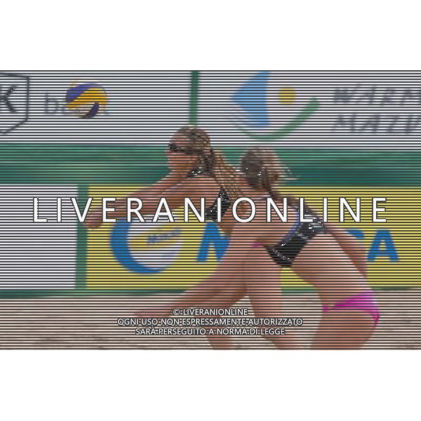 20.08.2014 - Stare Jablonki , siatkowka plazowa , beach volleyball , World Tour , FIVB Stare Jablonki Grand Slam 2014 , Brazylia (zolte) - Polska (czarne) , Brazil - Poland N/Z Katarzyna Kociolek , Dorota Strag Fot. Mariusz Palczynski / MPAimages.com/NEWSPIX.PL --- Newspix.pl /Agenzia Aldo Liverani sas - ITALY ONLY - Brasile - Polonia beach volley, World Tour, FIVB Grande Slam 2014 *** Local Caption *** www.newspix.pl mail us: info@newspix.pl call us: 0048 022 23 22 222 --- Polish Picture Agency by Ringier Axel Springer Poland
