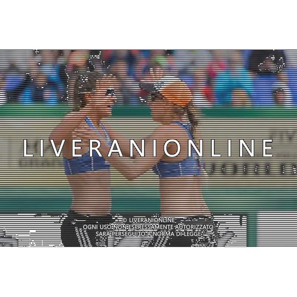 20.08.2014 - Stare Jablonki , siatkowka plazowa , beach volleyball , World Tour , FIVB Stare Jablonki Grand Slam 2014 , Polska (niebieskie) - Argentyna (biale) , Poland - Argentina N/Z Kinga Kolosinska , Monika Brzostek Fot. Mariusz Palczynski / MPAimages.com/NEWSPIX.PL --- Newspix.pl /Agenzia Aldo Liverani sas - ITALY ONLY - Polonia - Argentina beach volley, World Tour, FIVB Grande Slam 2014 *** Local Caption *** www.newspix.pl mail us: info@newspix.pl call us: 0048 022 23 22 222 --- Polish Picture Agency by Ringier Axel Springer Poland