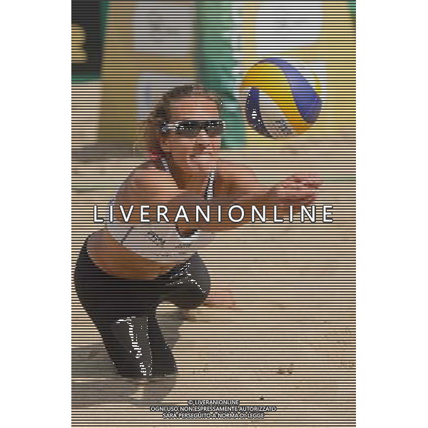 20.08.2014 - Stare Jablonki , siatkowka plazowa , beach volleyball , World Tour , FIVB Stare Jablonki Grand Slam 2014 , Polska (niebieskie) - Argentyna (biale) , Poland - Argentina N/Z Ana Gallay Fot. Mariusz Palczynski / MPAimages.com/NEWSPIX.PL --- Newspix.pl /Agenzia Aldo Liverani sas - ITALY ONLY - Polonia - Argentina beach volley, World Tour, FIVB Grande Slam 2014 *** Local Caption *** www.newspix.pl mail us: info@newspix.pl call us: 0048 022 23 22 222 --- Polish Picture Agency by Ringier Axel Springer Poland