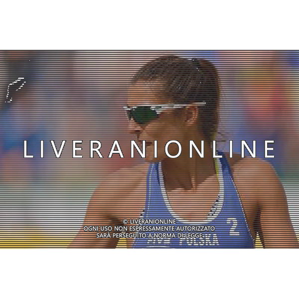 20.08.2014 - Stare Jablonki , siatkowka plazowa , beach volleyball , World Tour , FIVB Stare Jablonki Grand Slam 2014 , Polska (niebieskie) - Argentyna (biale) , Poland - Argentina N/Z Kinga Kolosinska Fot. Mariusz Palczynski / MPAimages.com/NEWSPIX.PL --- Newspix.pl /Agenzia Aldo Liverani sas - ITALY ONLY - Polonia - Argentina beach volley, World Tour, FIVB Grande Slam 2014 *** Local Caption *** www.newspix.pl mail us: info@newspix.pl call us: 0048 022 23 22 222 --- Polish Picture Agency by Ringier Axel Springer Poland