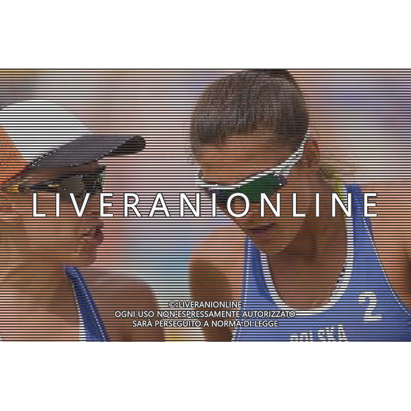 20.08.2014 - Stare Jablonki , siatkowka plazowa , beach volleyball , World Tour , FIVB Stare Jablonki Grand Slam 2014 , Polska (niebieskie) - Argentyna (biale) , Poland - Argentina N/Z Monika Brzostek , Kinga Kolosinska Fot. Mariusz Palczynski / MPAimages.com/NEWSPIX.PL --- Newspix.pl /Agenzia Aldo Liverani sas - ITALY ONLY - Polonia - Argentina beach volley, World Tour, FIVB Grande Slam 2014 *** Local Caption *** www.newspix.pl mail us: info@newspix.pl call us: 0048 022 23 22 222 --- Polish Picture Agency by Ringier Axel Springer Poland