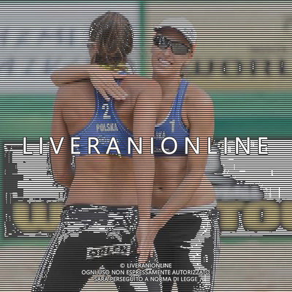 20.08.2014 - Stare Jablonki , siatkowka plazowa , beach volleyball , World Tour , FIVB Stare Jablonki Grand Slam 2014 , Polska (niebieskie) - Argentyna (biale) , Poland - Argentina N/Z Kinga Kolosinska , Monika Brzostek Fot. Mariusz Palczynski / MPAimages.com/NEWSPIX.PL --- Newspix.pl /Agenzia Aldo Liverani sas - ITALY ONLY - Polonia - Argentina beach volley, World Tour, FIVB Grande Slam 2014 *** Local Caption *** www.newspix.pl mail us: info@newspix.pl call us: 0048 022 23 22 222 --- Polish Picture Agency by Ringier Axel Springer Poland