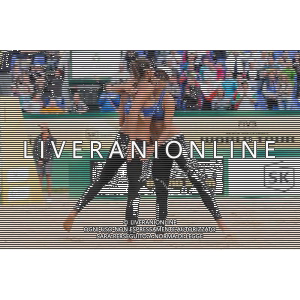 20.08.2014 - Stare Jablonki , siatkowka plazowa , beach volleyball , World Tour , FIVB Stare Jablonki Grand Slam 2014 , Polska (niebieskie) - Argentyna (biale) , Poland - Argentina N/Z Kinga Kolosinska , Monika Brzostek Fot. Mariusz Palczynski / MPAimages.com/NEWSPIX.PL --- Newspix.pl /Agenzia Aldo Liverani sas - ITALY ONLY - Polonia - Argentina beach volley, World Tour, FIVB Grande Slam 2014 *** Local Caption *** www.newspix.pl mail us: info@newspix.pl call us: 0048 022 23 22 222 --- Polish Picture Agency by Ringier Axel Springer Poland