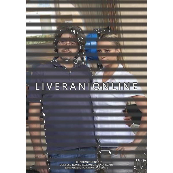 Claudio Uberti e Martina Stella. Hotel Vittoria, primo giorno di riprese del film Rosso 1000 Miglia. Brescia 20 Agosto 2014. AG ALDO LIVERANI SAS 