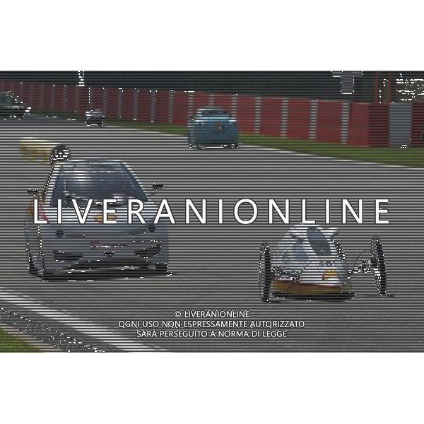 Fernando Alonso (ESP) Ferrari and team mate Kimi Raikkonen (FIN) Ferrari drive cars from the Shell Eco Marathon. 21.08.2014. Formula 1 World Championship, Rd 12, Belgian Grand Prix, Spa Francorchamps, Belgium, Preparation Day. AG ALDO LIVERANI SAS ONLY ITALY