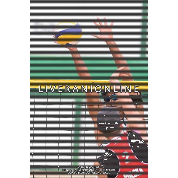 21.08.2014 - Stare Jablonki , siatkowka plazowa , beach volleyball , World Tour , FIVB Stare Jablonki Grand Slam 2014 , Polska (czerwone) - Brazylia (biale) , Poland - Brazil N/Z Ricardo Alex Costa Santos , Jakub Szalankiewicz Fot. Mariusz Palczynski / MPAimages.com/NEWSPIX.PL --- Newspix.pl /Agenzia Aldo Liverani sas - ITALY ONLY - Polonia - Brasile beach volley, World Tour, FIVB Stare Jablonki Grande Slam 2014 *** Local Caption *** www.newspix.pl mail us: info@newspix.pl call us: 0048 022 23 22 222 --- Polish Picture Agency by Ringier Axel Springer Poland