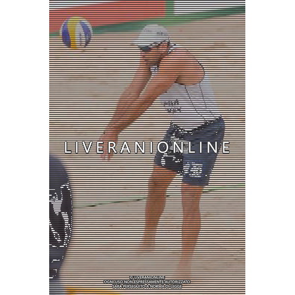21.08.2014 - Stare Jablonki , siatkowka plazowa , beach volleyball , World Tour , FIVB Stare Jablonki Grand Slam 2014 , Polska (czerwone) - Brazylia (biale) , Poland - Brazil N/Z Marcio Henrique Barroso Araujo Fot. Mariusz Palczynski / MPAimages.com/NEWSPIX.PL --- Newspix.pl /Agenzia Aldo Liverani sas - ITALY ONLY - Polonia - Brasile beach volley, World Tour, FIVB Stare Jablonki Grande Slam 2014 *** Local Caption *** www.newspix.pl mail us: info@newspix.pl call us: 0048 022 23 22 222 --- Polish Picture Agency by Ringier Axel Springer Poland