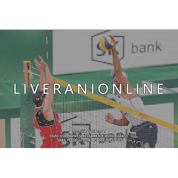 21.08.2014 - Stare Jablonki , siatkowka plazowa , beach volleyball , World Tour , FIVB Stare Jablonki Grand Slam 2014 , Polska (czerwone) - Brazylia (biale) , Poland - Brazil N/Z Michal Kadziola , Marcio Henrique Barroso Araujo Fot. Mariusz Palczynski / MPAimages.com/NEWSPIX.PL --- Newspix.pl /Agenzia Aldo Liverani sas - ITALY ONLY - Polonia - Brasile beach volley, World Tour, FIVB Stare Jablonki Grande Slam 2014 *** Local Caption *** www.newspix.pl mail us: info@newspix.pl call us: 0048 022 23 22 222 --- Polish Picture Agency by Ringier Axel Springer Poland