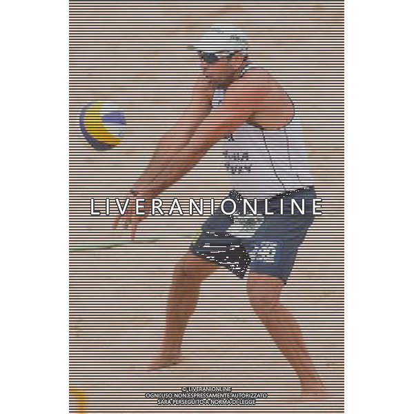 21.08.2014 - Stare Jablonki , siatkowka plazowa , beach volleyball , World Tour , FIVB Stare Jablonki Grand Slam 2014 , Polska (czerwone) - Brazylia (biale) , Poland - Brazil N/Z Marcio Henrique Barroso Araujo Fot. Mariusz Palczynski / MPAimages.com/NEWSPIX.PL --- Newspix.pl /Agenzia Aldo Liverani sas - ITALY ONLY - Polonia - Brasile beach volley, World Tour, FIVB Stare Jablonki Grande Slam 2014 *** Local Caption *** www.newspix.pl mail us: info@newspix.pl call us: 0048 022 23 22 222 --- Polish Picture Agency by Ringier Axel Springer Poland