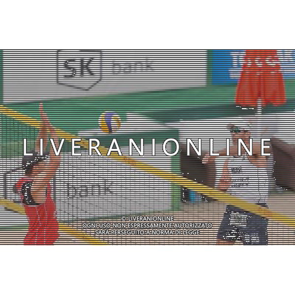 21.08.2014 - Stare Jablonki , siatkowka plazowa , beach volleyball , World Tour , FIVB Stare Jablonki Grand Slam 2014 , Polska (czerwone) - Brazylia (biale) , Poland - Brazil N/Z Michal Kadziola , Marcio Henrique Barroso Araujo Fot. Mariusz Palczynski / MPAimages.com/NEWSPIX.PL --- Newspix.pl /Agenzia Aldo Liverani sas - ITALY ONLY - Polonia - Brasile beach volley, World Tour, FIVB Stare Jablonki Grande Slam 2014 *** Local Caption *** www.newspix.pl mail us: info@newspix.pl call us: 0048 022 23 22 222 --- Polish Picture Agency by Ringier Axel Springer Poland