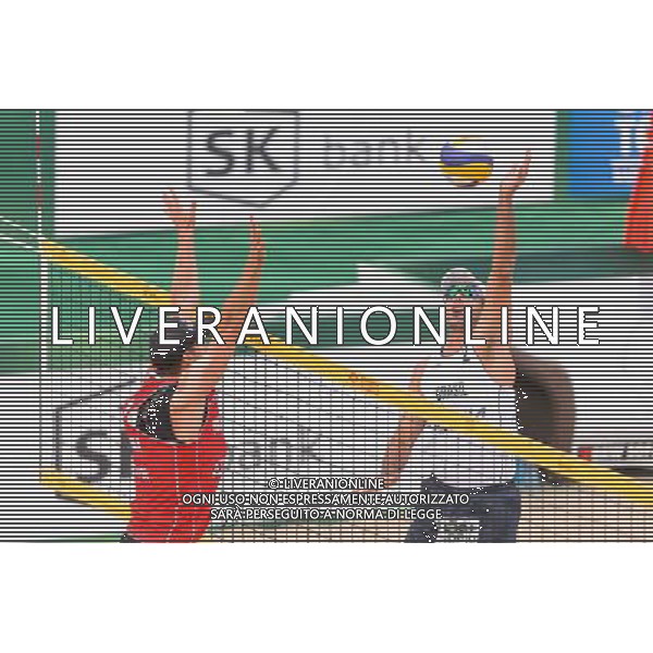 21.08.2014 - Stare Jablonki , siatkowka plazowa , beach volleyball , World Tour , FIVB Stare Jablonki Grand Slam 2014 , Polska (czerwone) - Brazylia (biale) , Poland - Brazil N/Z Michal Kadziola , Marcio Henrique Barroso Araujo Fot. Mariusz Palczynski / MPAimages.com/NEWSPIX.PL --- Newspix.pl /Agenzia Aldo Liverani sas - ITALY ONLY - Polonia - Brasile beach volley, World Tour, FIVB Stare Jablonki Grande Slam 2014 *** Local Caption *** www.newspix.pl mail us: info@newspix.pl call us: 0048 022 23 22 222 --- Polish Picture Agency by Ringier Axel Springer Poland