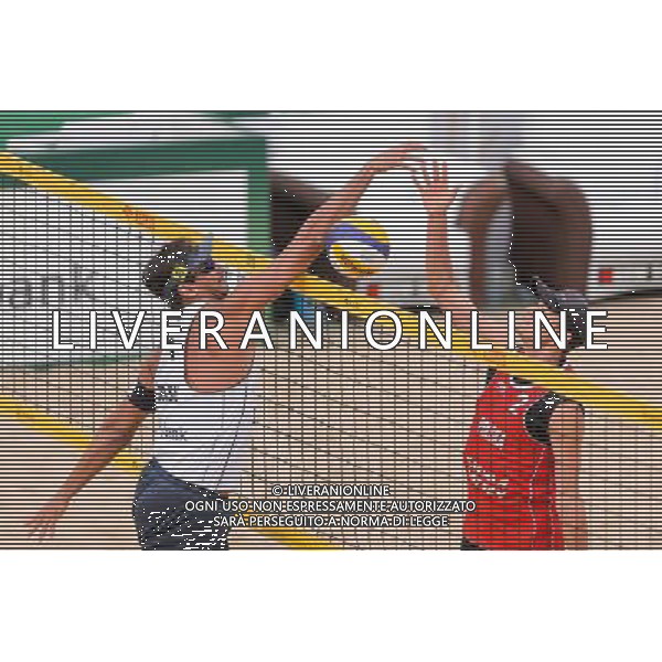 21.08.2014 - Stare Jablonki , siatkowka plazowa , beach volleyball , World Tour , FIVB Stare Jablonki Grand Slam 2014 , Polska (czerwone) - Brazylia (biale) , Poland - Brazil N/Z Ricardo Alex Costa Santos , Jakub Szalankiewicz Fot. Mariusz Palczynski / MPAimages.com/NEWSPIX.PL --- Newspix.pl /Agenzia Aldo Liverani sas - ITALY ONLY - Polonia - Brasile beach volley, World Tour, FIVB Stare Jablonki Grande Slam 2014 *** Local Caption *** www.newspix.pl mail us: info@newspix.pl call us: 0048 022 23 22 222 --- Polish Picture Agency by Ringier Axel Springer Poland