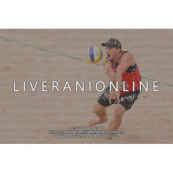 21.08.2014 - Stare Jablonki , siatkowka plazowa , beach volleyball , World Tour , FIVB Stare Jablonki Grand Slam 2014 , Polska (czerwone) - Brazylia (biale) , Poland - Brazil N/Z Michal Kadziola Fot. Mariusz Palczynski / MPAimages.com/NEWSPIX.PL --- Newspix.pl /Agenzia Aldo Liverani sas - ITALY ONLY - Polonia - Brasile beach volley, World Tour, FIVB Stare Jablonki Grande Slam 2014 *** Local Caption *** www.newspix.pl mail us: info@newspix.pl call us: 0048 022 23 22 222 --- Polish Picture Agency by Ringier Axel Springer Poland