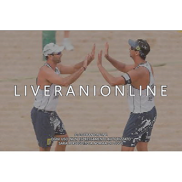 21.08.2014 - Stare Jablonki , siatkowka plazowa , beach volleyball , World Tour , FIVB Stare Jablonki Grand Slam 2014 , Polska (czerwone) - Brazylia (biale) , Poland - Brazil N/Z Marcio Henrique Barroso Araujo , Ricardo Alex Costa Santos Fot. Mariusz Palczynski / MPAimages.com/NEWSPIX.PL --- Newspix.pl /Agenzia Aldo Liverani sas - ITALY ONLY - Polonia - Brasile beach volley, World Tour, FIVB Stare Jablonki Grande Slam 2014 *** Local Caption *** www.newspix.pl mail us: info@newspix.pl call us: 0048 022 23 22 222 --- Polish Picture Agency by Ringier Axel Springer Poland