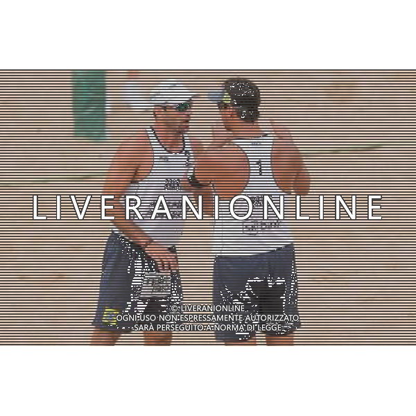 21.08.2014 - Stare Jablonki , siatkowka plazowa , beach volleyball , World Tour , FIVB Stare Jablonki Grand Slam 2014 , Polska (czerwone) - Brazylia (biale) , Poland - Brazil N/Z Marcio Henrique Barroso Araujo , Ricardo Alex Costa Santos Fot. Mariusz Palczynski / MPAimages.com/NEWSPIX.PL --- Newspix.pl /Agenzia Aldo Liverani sas - ITALY ONLY - Polonia - Brasile beach volley, World Tour, FIVB Stare Jablonki Grande Slam 2014 *** Local Caption *** www.newspix.pl mail us: info@newspix.pl call us: 0048 022 23 22 222 --- Polish Picture Agency by Ringier Axel Springer Poland
