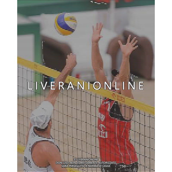 21.08.2014 - Stare Jablonki , siatkowka plazowa , beach volleyball , World Tour , FIVB Stare Jablonki Grand Slam 2014 , Polska (czerwone) - Brazylia (biale) , Poland - Brazil N/Z Marcio Henrique Barroso Araujo , Michal Kadziola Fot. Mariusz Palczynski / MPAimages.com/NEWSPIX.PL --- Newspix.pl /Agenzia Aldo Liverani sas - ITALY ONLY - Polonia - Brasile beach volley, World Tour, FIVB Stare Jablonki Grande Slam 2014 *** Local Caption *** www.newspix.pl mail us: info@newspix.pl call us: 0048 022 23 22 222 --- Polish Picture Agency by Ringier Axel Springer Poland