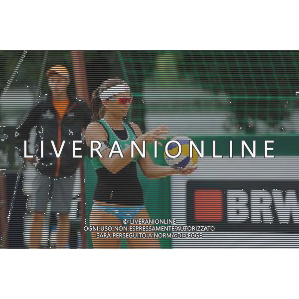 21.08.2014 - Stare Jablonki , siatkowka plazowa , beach volleyball , World Tour , FIVB Stare Jablonki Grand Slam 2014 , Brazylia (czerwone) - Wlochy (zielone) , Brazil (red) - Italy (green) N/Z Marta Menegatti Fot. Karol Bartnik / MPAimages.com/NEWSPIX.PL --- Newspix.pl /Agenzia Aldo Liverani sas - ITALY ONLY - Brasile - Italia beach volley femminile, World Tour, FIVB Stare Jablonki Grande Slam 2014 *** Local Caption *** www.newspix.pl mail us: info@newspix.pl call us: 0048 022 23 22 222 --- Polish Picture Agency by Ringier Axel Springer Poland