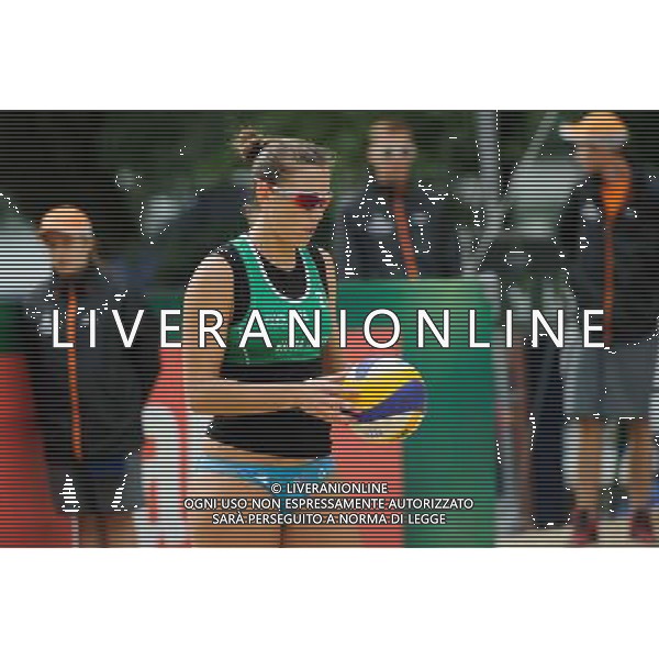 21.08.2014 - Stare Jablonki , siatkowka plazowa , beach volleyball , World Tour , FIVB Stare Jablonki Grand Slam 2014 , Brazylia (czerwone) - Wlochy (zielone) , Brazil (red) - Italy (green) N/Z Viktoria Orsi Toth Fot. Karol Bartnik / MPAimages.com/NEWSPIX.PL --- Newspix.pl /Agenzia Aldo Liverani sas - ITALY ONLY - Brasile - Italia beach volley femminile, World Tour, FIVB Stare Jablonki Grande Slam 2014 *** Local Caption *** www.newspix.pl mail us: info@newspix.pl call us: 0048 022 23 22 222 --- Polish Picture Agency by Ringier Axel Springer Poland
