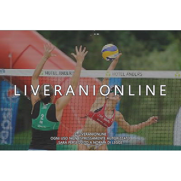 21.08.2014 - Stare Jablonki , siatkowka plazowa , beach volleyball , World Tour , FIVB Stare Jablonki Grand Slam 2014 , Brazylia (czerwone) - Wlochy (zielone) , Brazil (red) - Italy (green) N/Z Viktoria Orsi Toth , Maria Antonelli Fot. Karol Bartnik / MPAimages.com/NEWSPIX.PL --- Newspix.pl /Agenzia Aldo Liverani sas - ITALY ONLY - Brasile - Italia beach volley femminile, World Tour, FIVB Stare Jablonki Grande Slam 2014 *** Local Caption *** www.newspix.pl mail us: info@newspix.pl call us: 0048 022 23 22 222 --- Polish Picture Agency by Ringier Axel Springer Poland