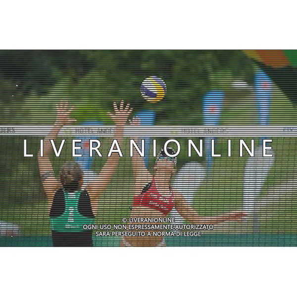 21.08.2014 - Stare Jablonki , siatkowka plazowa , beach volleyball , World Tour , FIVB Stare Jablonki Grand Slam 2014 , Brazylia (czerwone) - Wlochy (zielone) , Brazil (red) - Italy (green) N/Z Viktoria Orsi Toth , Maria Antonelli Fot. Karol Bartnik / MPAimages.com/NEWSPIX.PL --- Newspix.pl /Agenzia Aldo Liverani sas - ITALY ONLY - Brasile - Italia beach volley femminile, World Tour, FIVB Stare Jablonki Grande Slam 2014 *** Local Caption *** www.newspix.pl mail us: info@newspix.pl call us: 0048 022 23 22 222 --- Polish Picture Agency by Ringier Axel Springer Poland