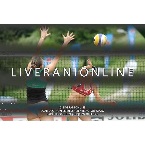 21.08.2014 - Stare Jablonki , siatkowka plazowa , beach volleyball , World Tour , FIVB Stare Jablonki Grand Slam 2014 , Brazylia (czerwone) - Wlochy (zielone) , Brazil (red) - Italy (green) N/Z Viktoria Orsi Toth , Maria Antonelli Fot. Karol Bartnik / MPAimages.com/NEWSPIX.PL --- Newspix.pl /Agenzia Aldo Liverani sas - ITALY ONLY - Brasile - Italia beach volley femminile, World Tour, FIVB Stare Jablonki Grande Slam 2014 *** Local Caption *** www.newspix.pl mail us: info@newspix.pl call us: 0048 022 23 22 222 --- Polish Picture Agency by Ringier Axel Springer Poland