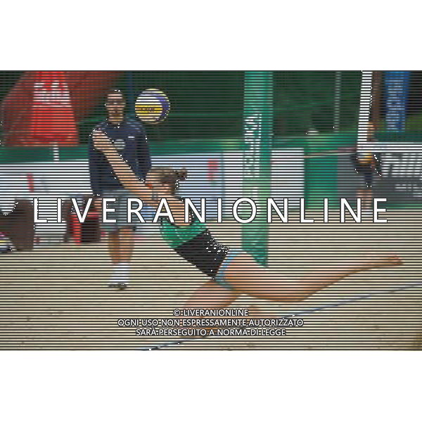 21.08.2014 - Stare Jablonki , siatkowka plazowa , beach volleyball , World Tour , FIVB Stare Jablonki Grand Slam 2014 , Brazylia (czerwone) - Wlochy (zielone) , Brazil (red) - Italy (green) N/Z Viktoria Orsi Toth Fot. Karol Bartnik / MPAimages.com/NEWSPIX.PL --- Newspix.pl /Agenzia Aldo Liverani sas - ITALY ONLY - Brasile - Italia beach volley femminile, World Tour, FIVB Stare Jablonki Grande Slam 2014 *** Local Caption *** www.newspix.pl mail us: info@newspix.pl call us: 0048 022 23 22 222 --- Polish Picture Agency by Ringier Axel Springer Poland