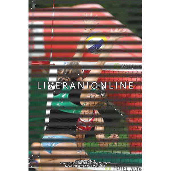21.08.2014 - Stare Jablonki , siatkowka plazowa , beach volleyball , World Tour , FIVB Stare Jablonki Grand Slam 2014 , Brazylia (czerwone) - Wlochy (zielone) , Brazil (red) - Italy (green) N/Z Viktoria Orsi Toth , Maria Antonelli Fot. Karol Bartnik / MPAimages.com/NEWSPIX.PL --- Newspix.pl /Agenzia Aldo Liverani sas - ITALY ONLY - Brasile - Italia beach volley femminile, World Tour, FIVB Stare Jablonki Grande Slam 2014 *** Local Caption *** www.newspix.pl mail us: info@newspix.pl call us: 0048 022 23 22 222 --- Polish Picture Agency by Ringier Axel Springer Poland